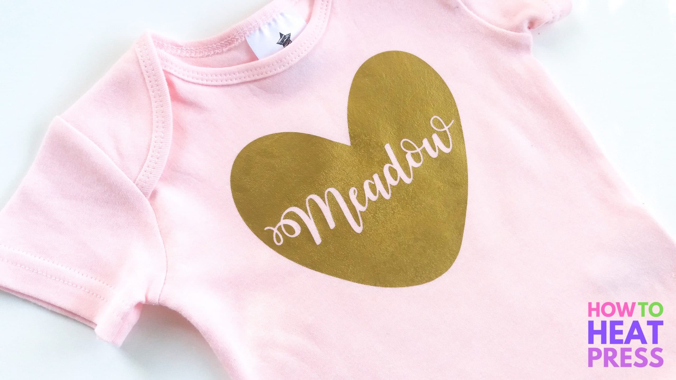 baby onesie with heat transfer vinyl project