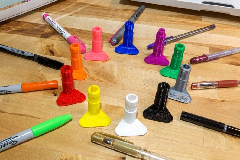 sharpies, gel pens, and adapters for cricut maker