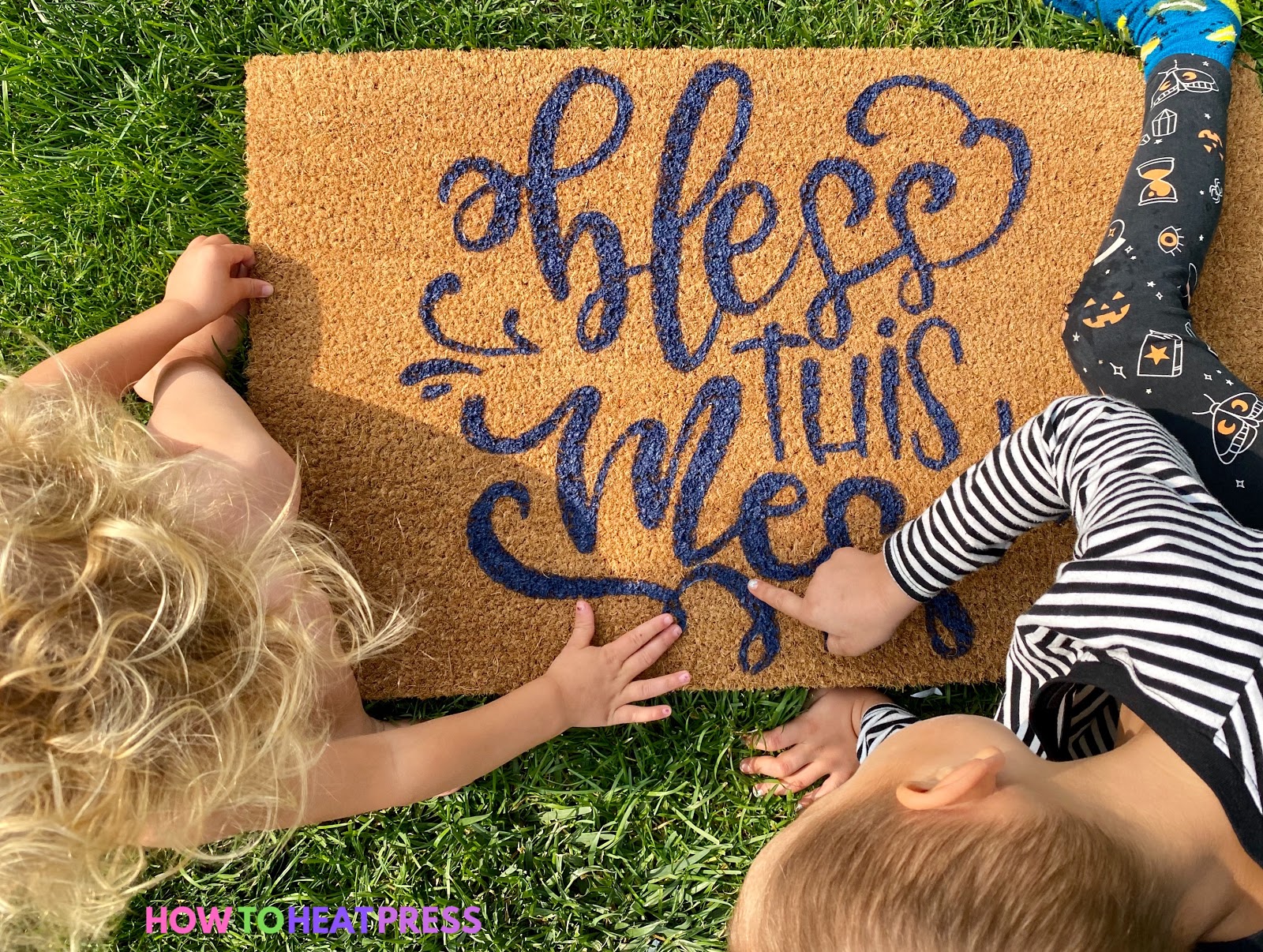 Tan DIY doormat with blue writing