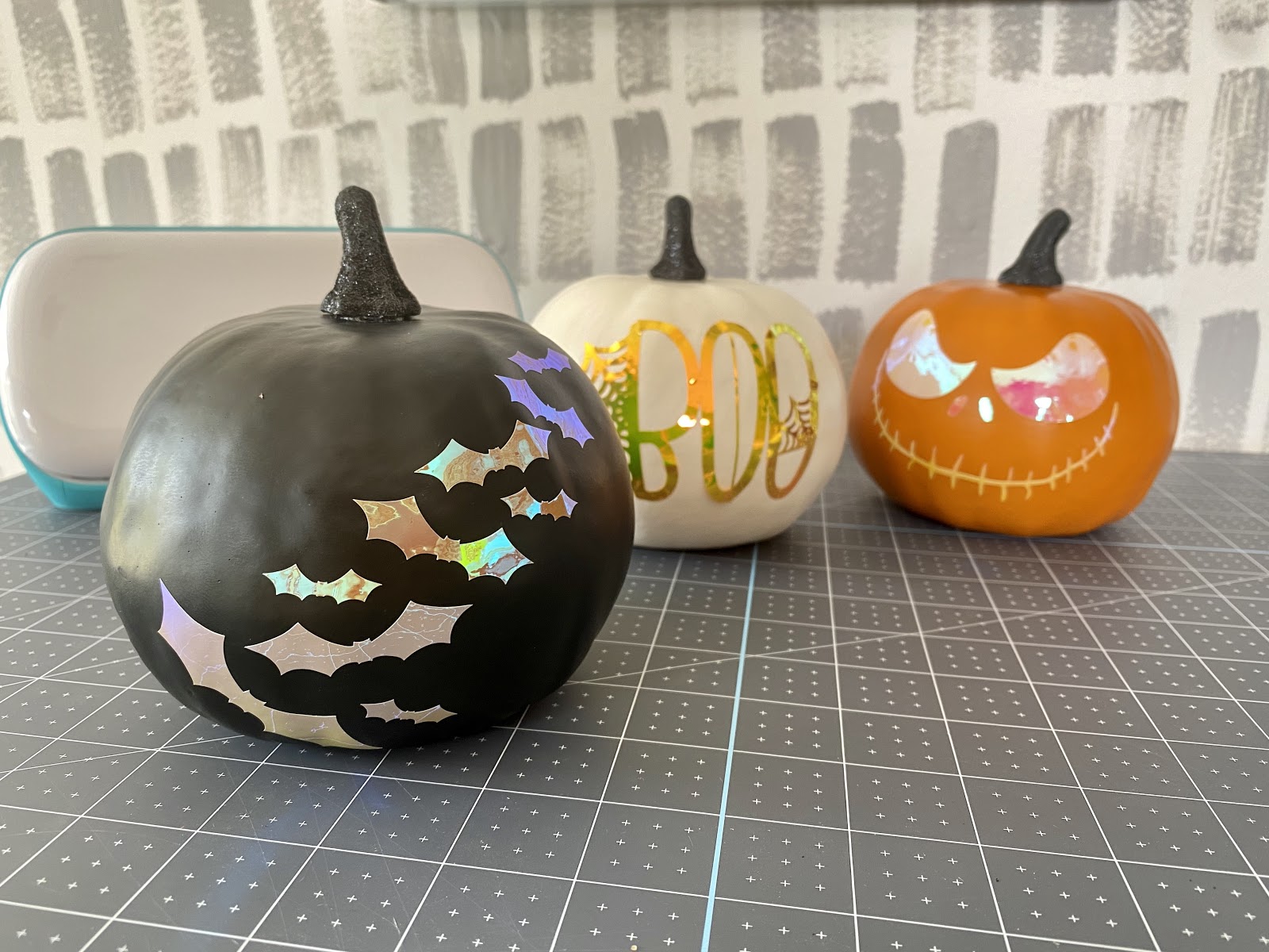 black white and orange cricut pumpkins with holographic vinyl