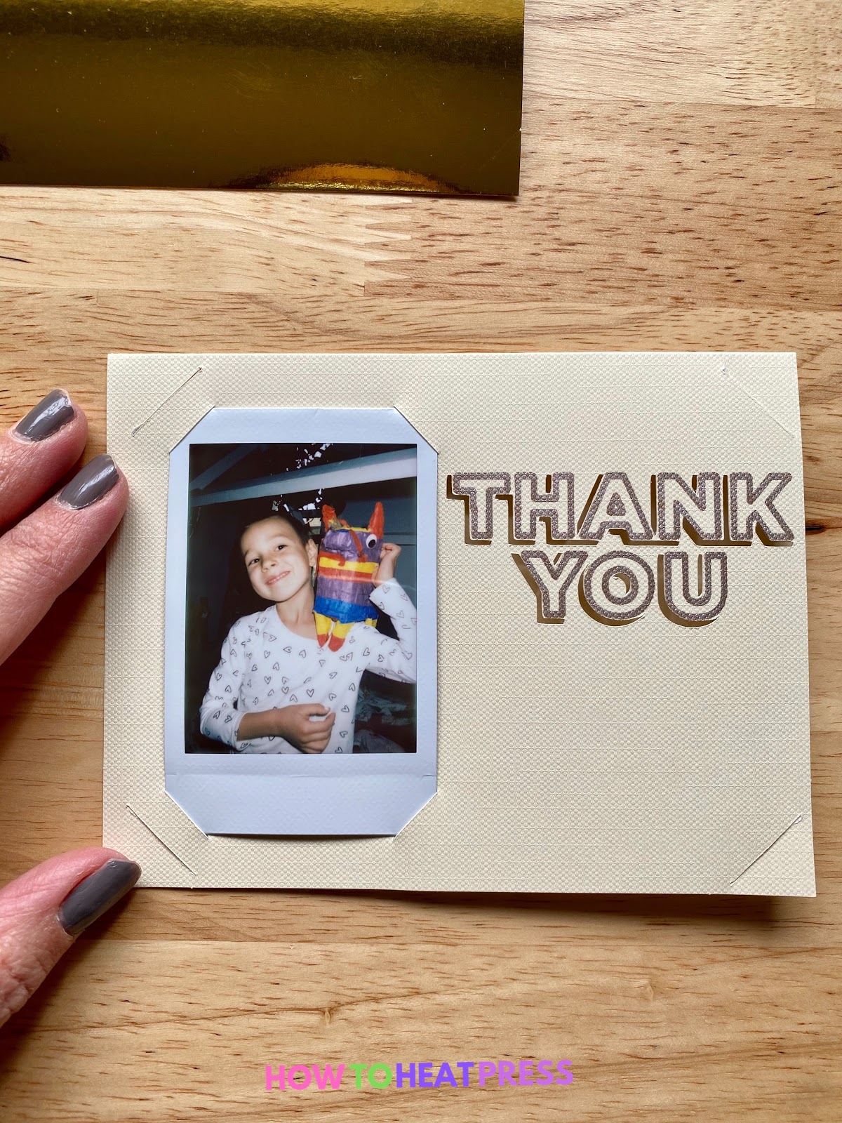 polaroid inserted into cream colored diy thank you card