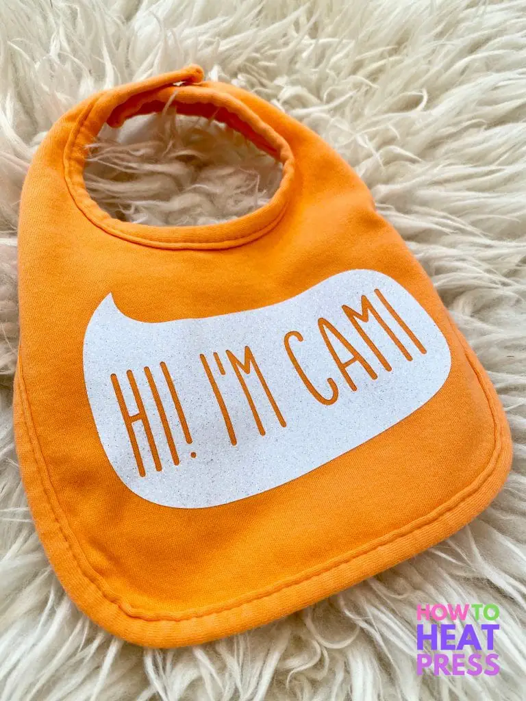 orange bib with glitter white vinyl