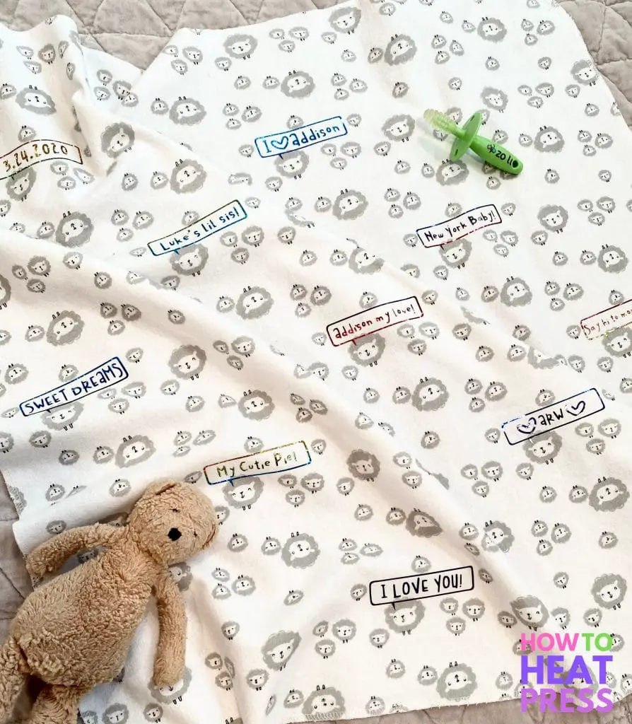 white baby blanket personalized with holographic htv