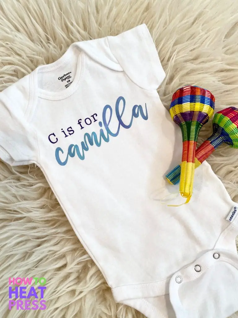 white onesie with watercolor blue cursive baby name