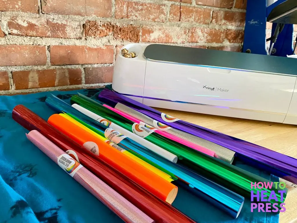 many colors of heat transfer vinyl with cricut maker and heat press for layering htv