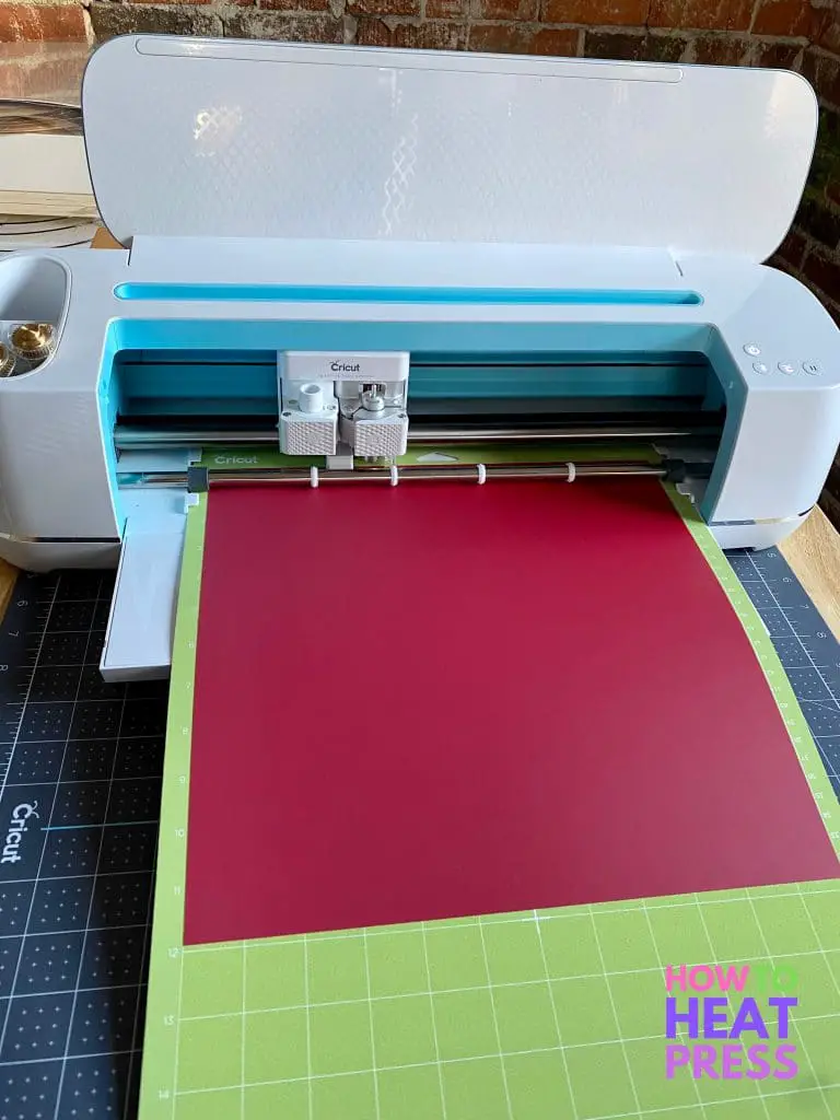cricut maker cutting red heat transfer vinyl